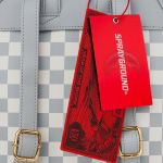 Immagine di Sprayground | Cream And Brown Tear Check Savage Backpack